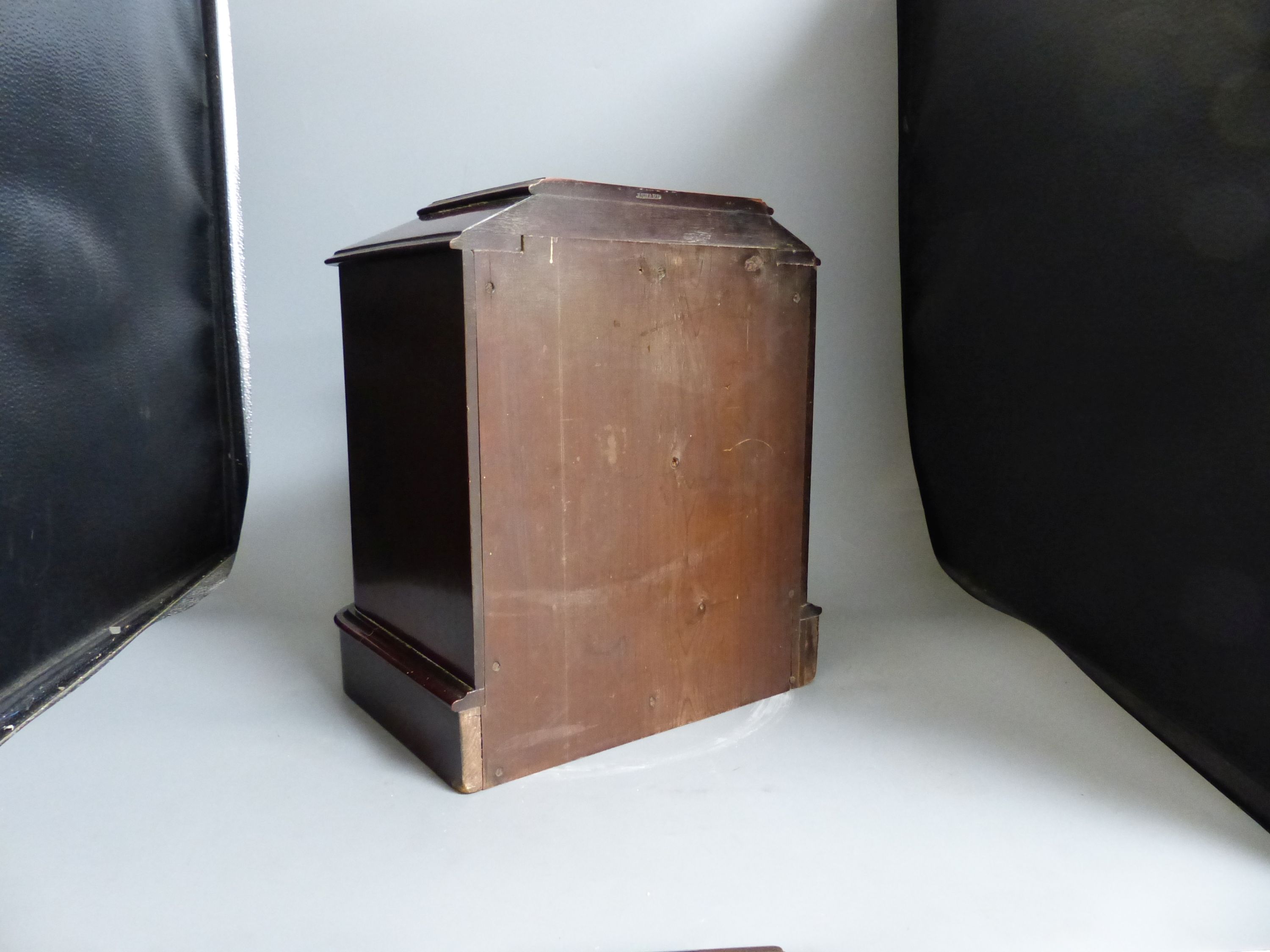 A Victorian miniature mahogany table top chest of drawers, height 35cm